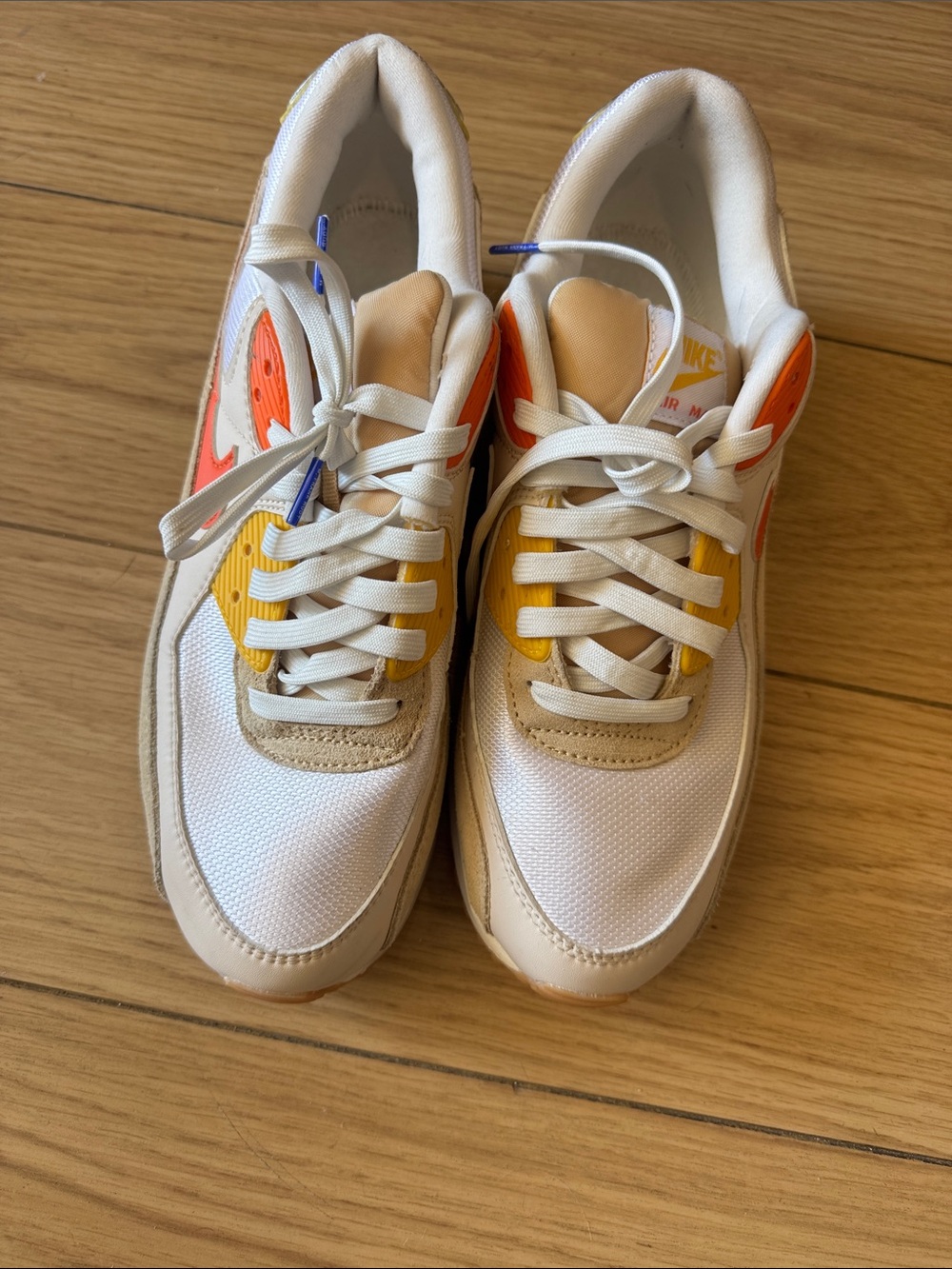Nike White Sneakers with Yellow and Orange Accents